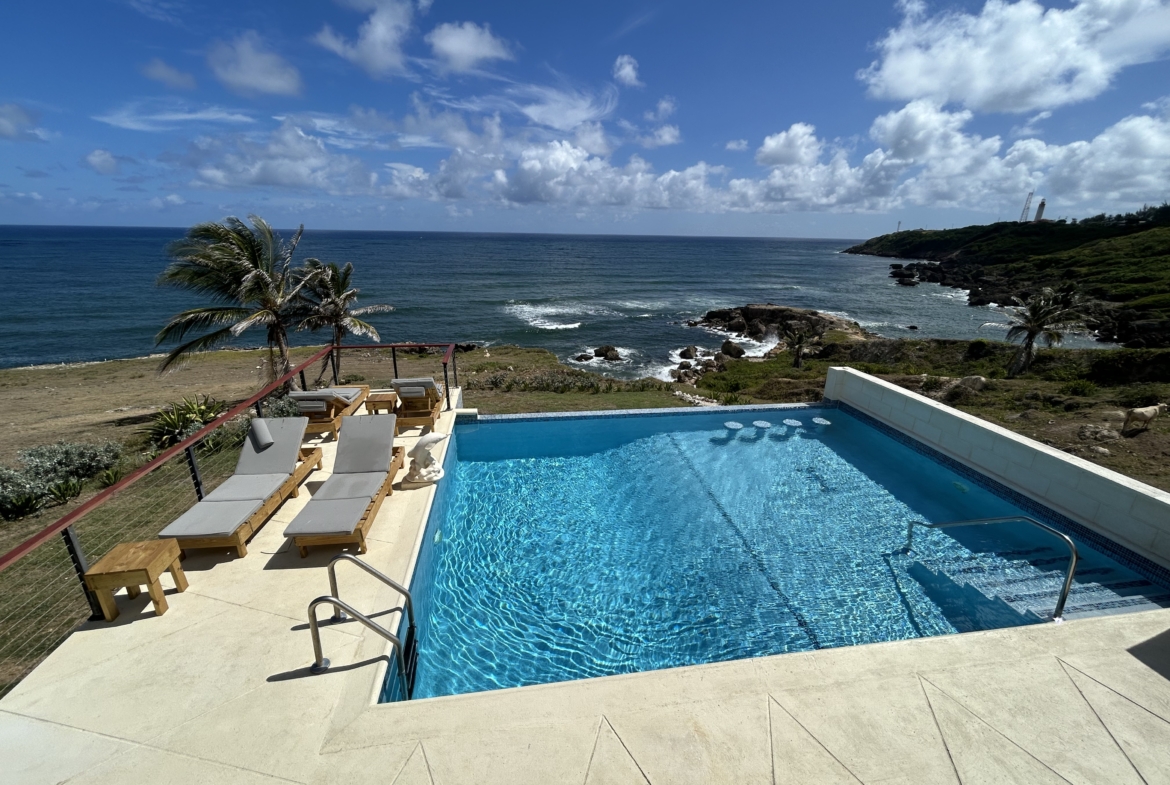 Lighthouse Landing Pool and ocean view scaled