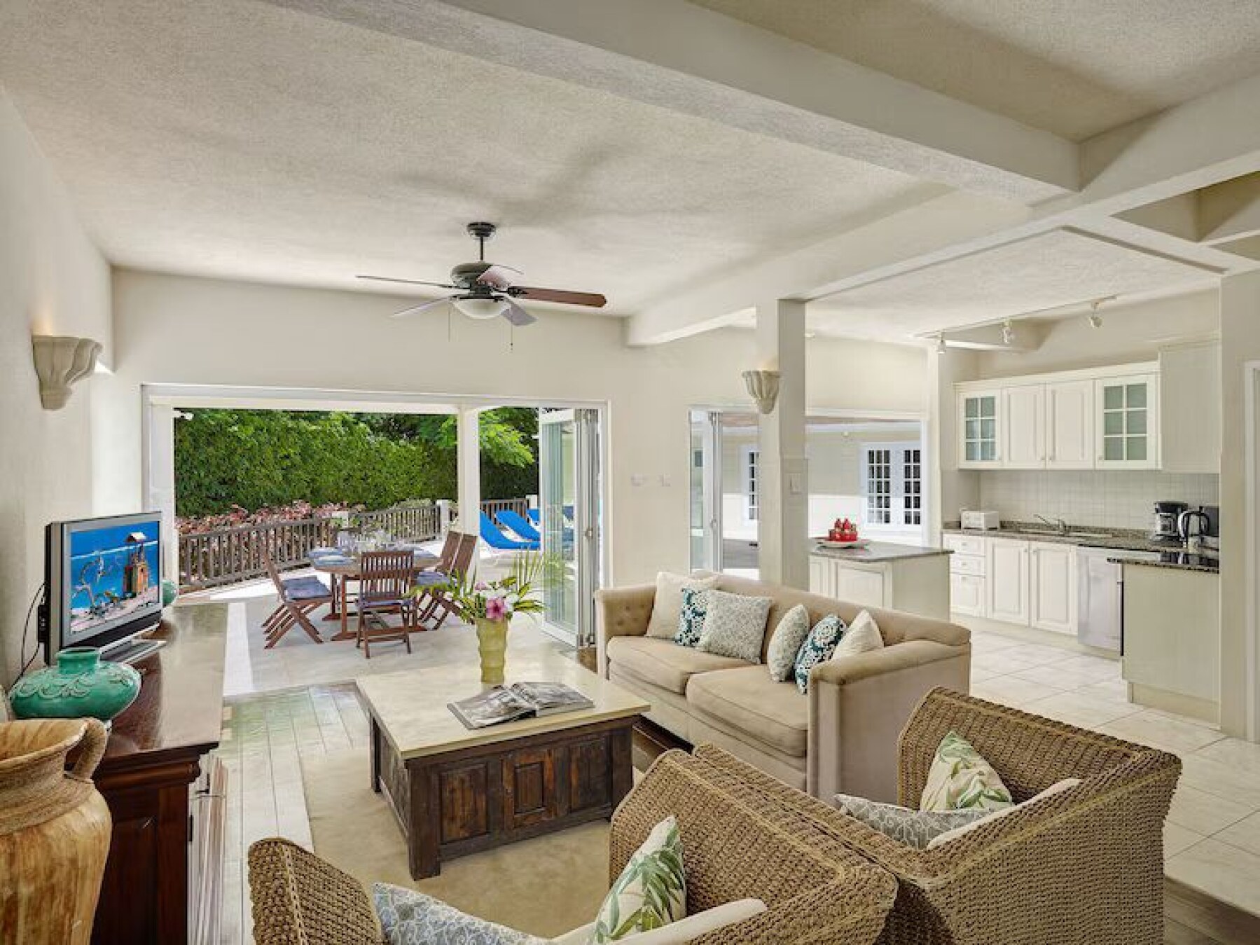Polamar gardens living room kitchen and patio