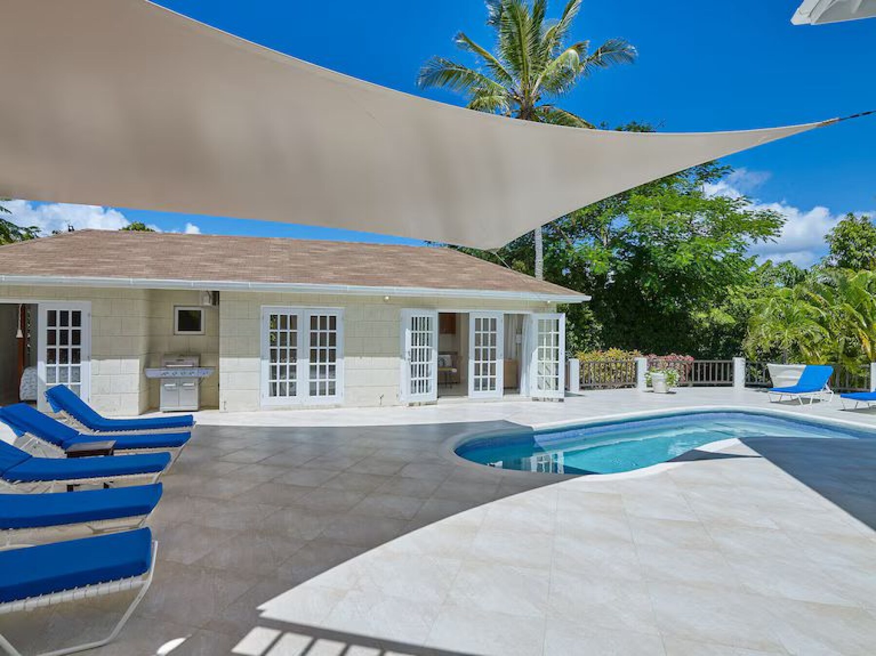 Polamar gardens pool and canopy