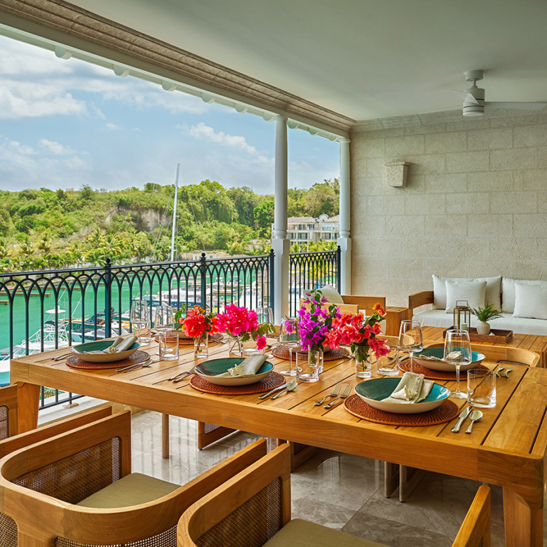 Pendry Residences Barbados patio dining table eith bougainvillea